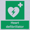 green-background-with-white-text-and-heart-defibrillator-symbol--white-cross-and~